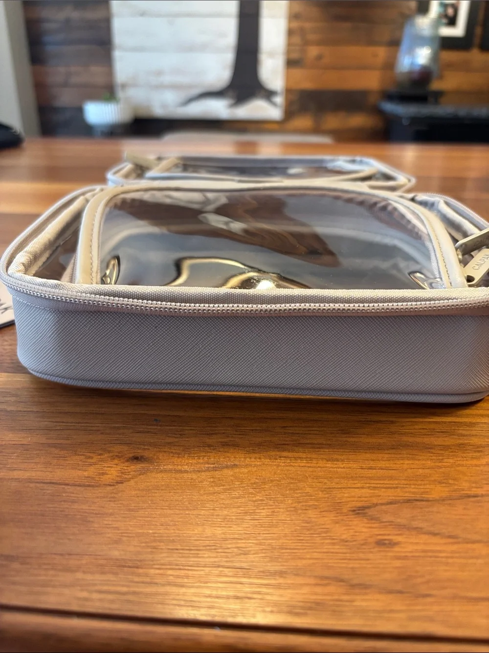 NWT New Calpak Beige Clear Travel Cosmetic Case